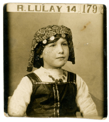 stickyback of young girl in some sort of traditional coin decorated headress, collection of Irma Benedetto