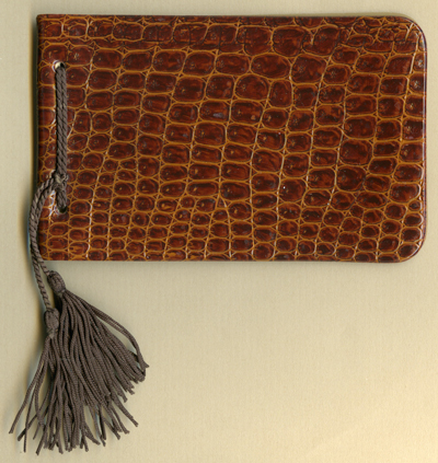 Polyfoto portrait booklet showing 48 portraits of a young child, 